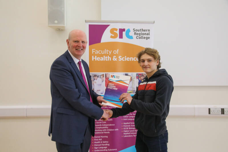 Brian Doran, SRC Principal and Chief Executive with winner Markus Grant