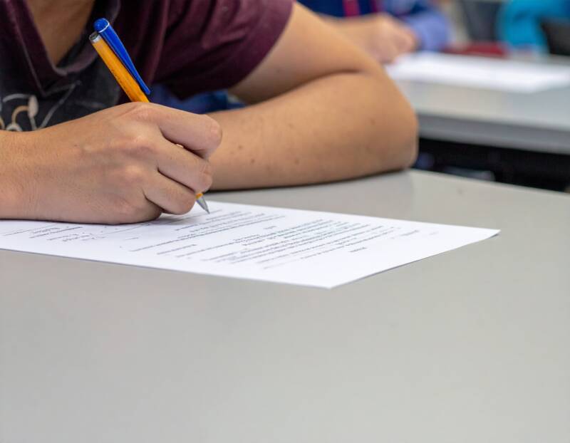 Picture students sitting exams